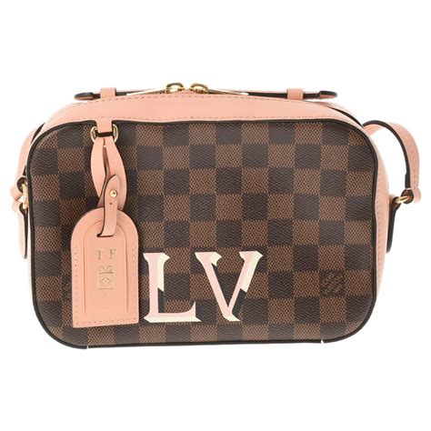 borsa louis vuitton stoffa e manico marrone e bianco|borsa louis vuitton bianca donna.